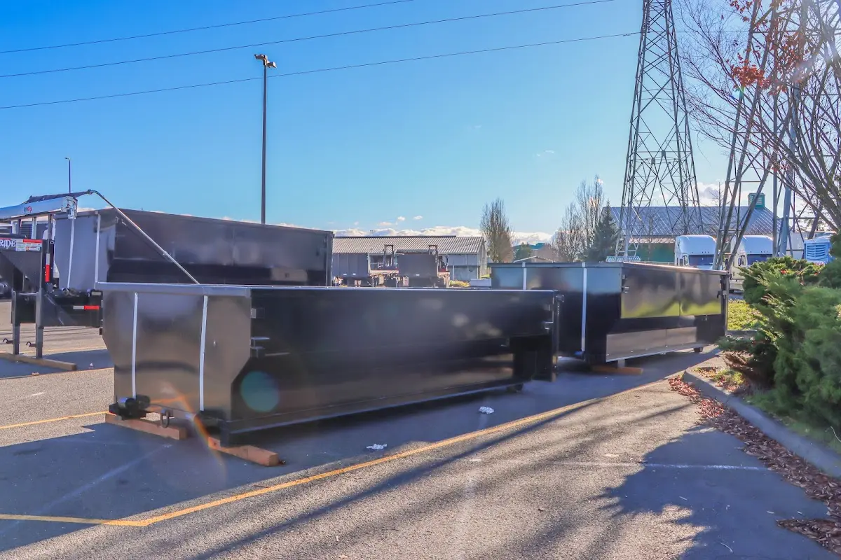 Roll-off dumpster ready for waste disposal at job site for 3 Yard Dumpster Rental in Coventry